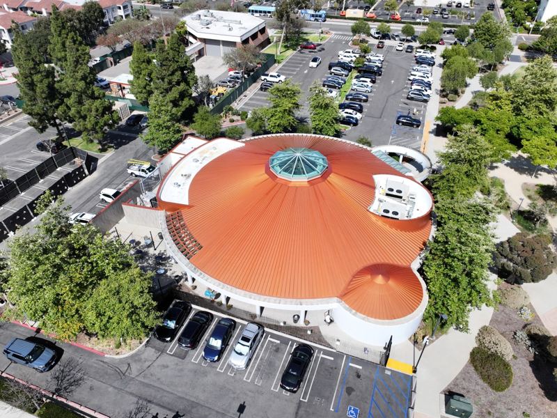 Aerial view of radial metal roof panels on the Norma Hertzog building