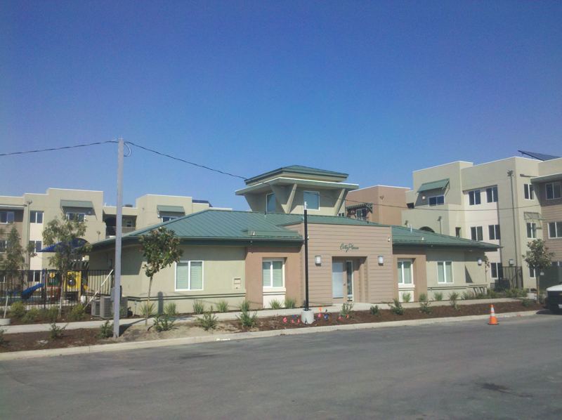 Green metal roof panels on a community building